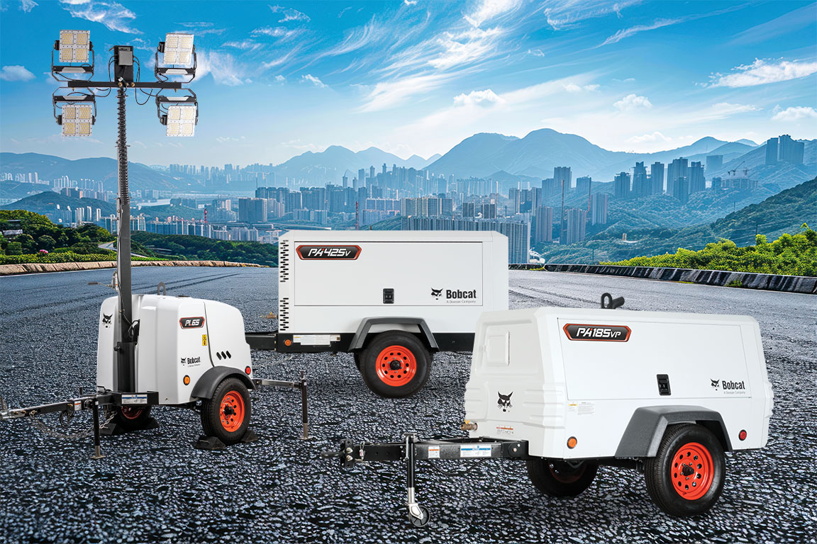 Bobcat portable PA185v and PA425v air compressors with a PL65 Light Tower on a highway.